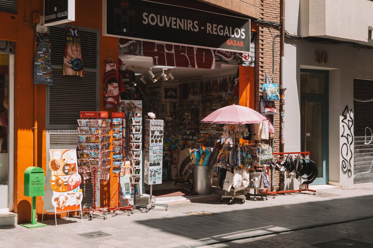 A vibrant souvenir shop in the streets of Valencia, offering gifts and local merchandise.